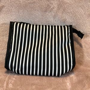 Contents black and white striped cosmetic pouch